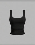 Black crop top styled with an urban skirt
