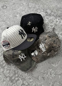 Cap, hoodie and layered urban streetwear